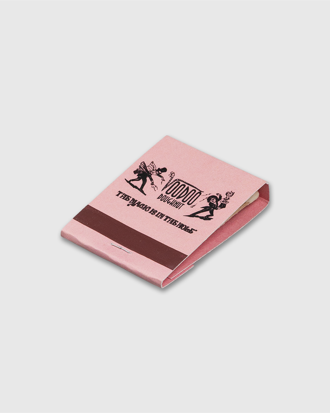 Pink notebook with black text and illustrations on a white background