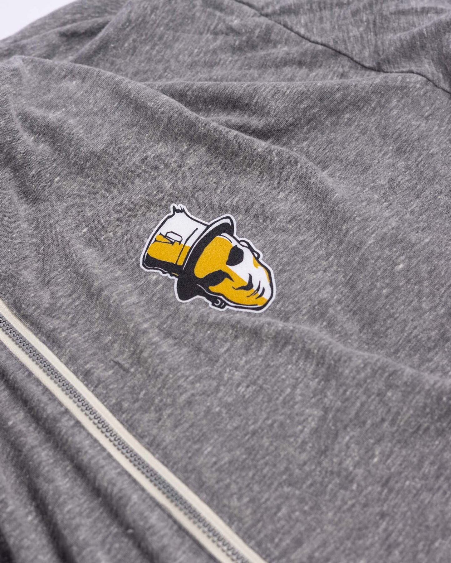 grey full-zip hoodie with voodoo baron mark on left chest