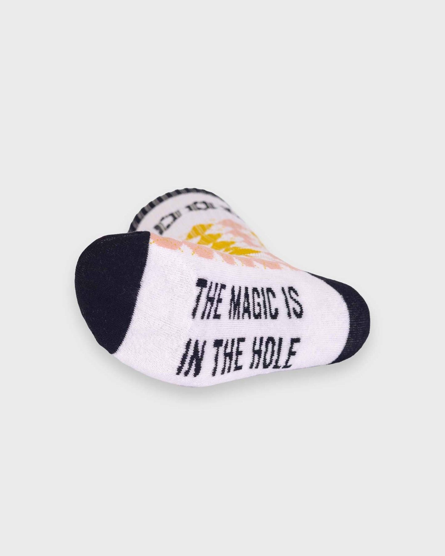 white voodoo socks with gold, pink and black graphics