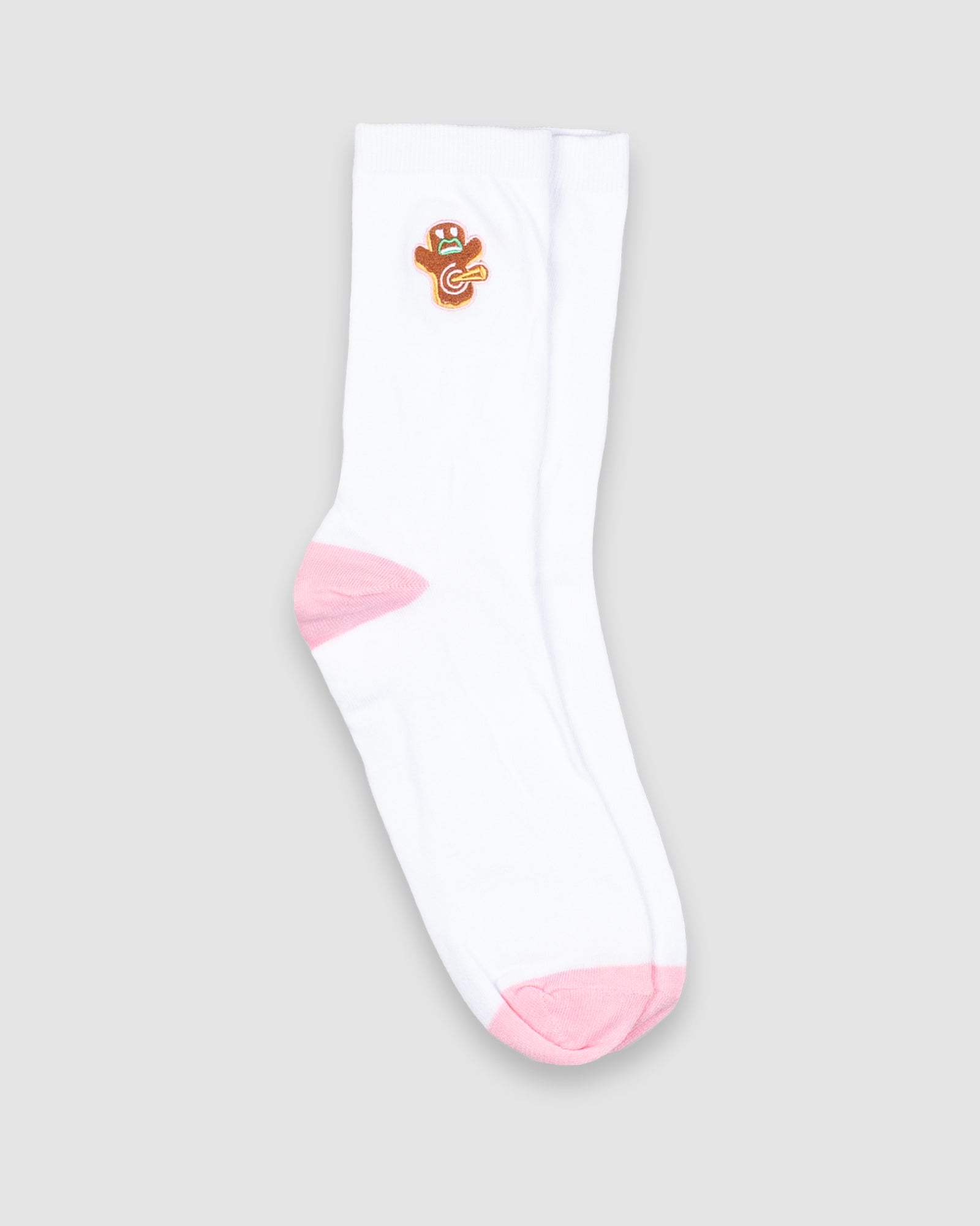 White sock with pink accents on a gray background