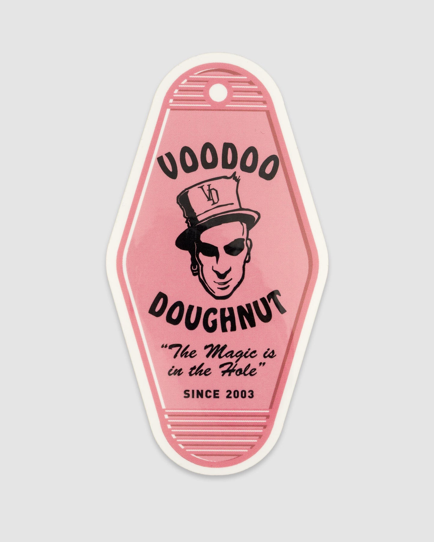 Pink Voodoo Doughnut sticker on a light gray background