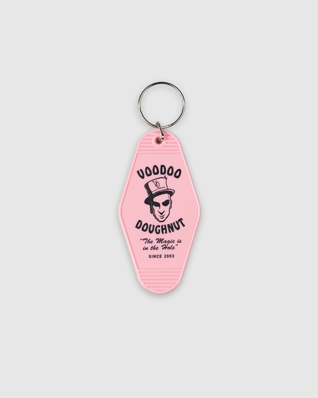 Pink keychain with Voodoo Doughnut logo