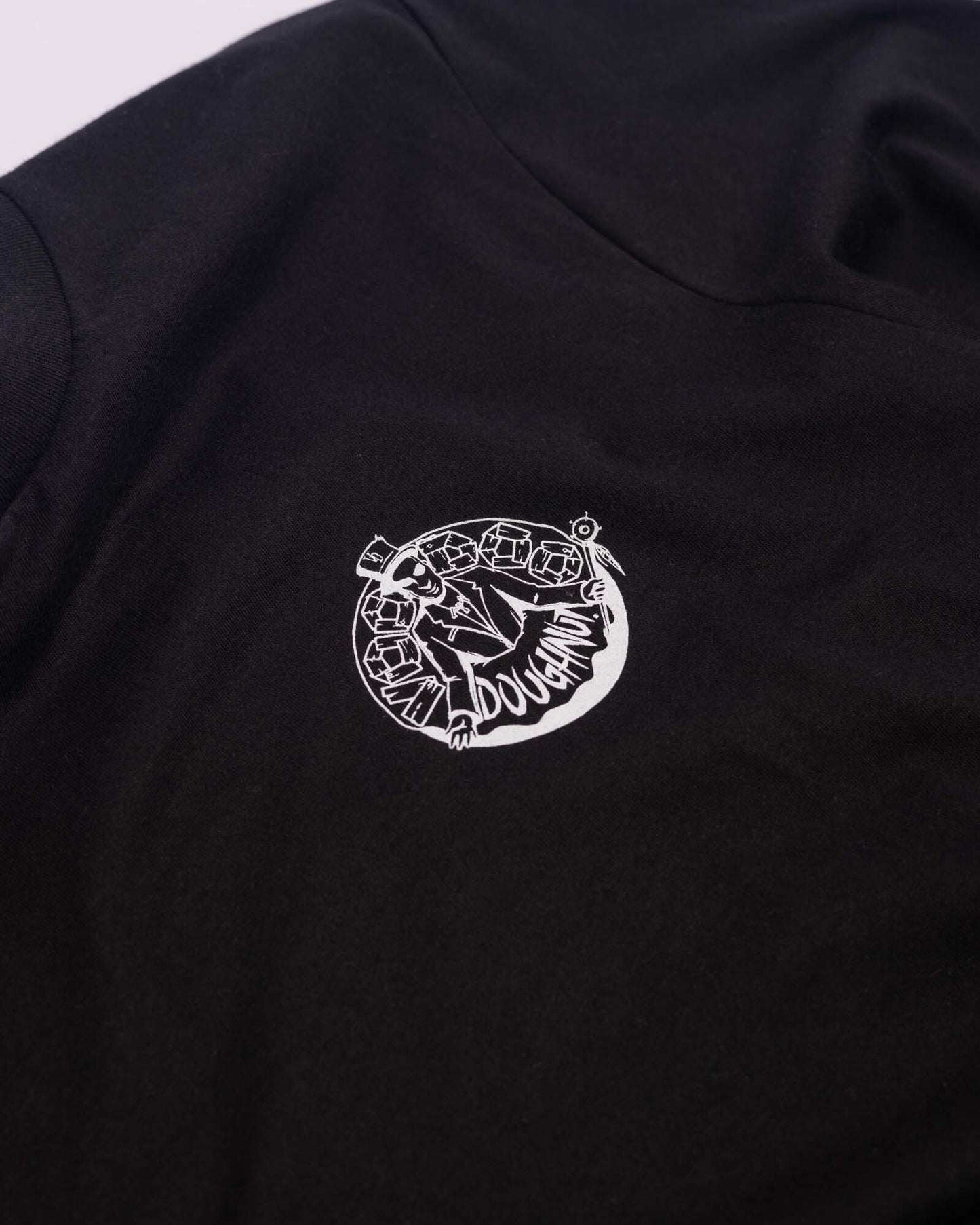 black t-shirt with white voodoo baron logo on front left chest