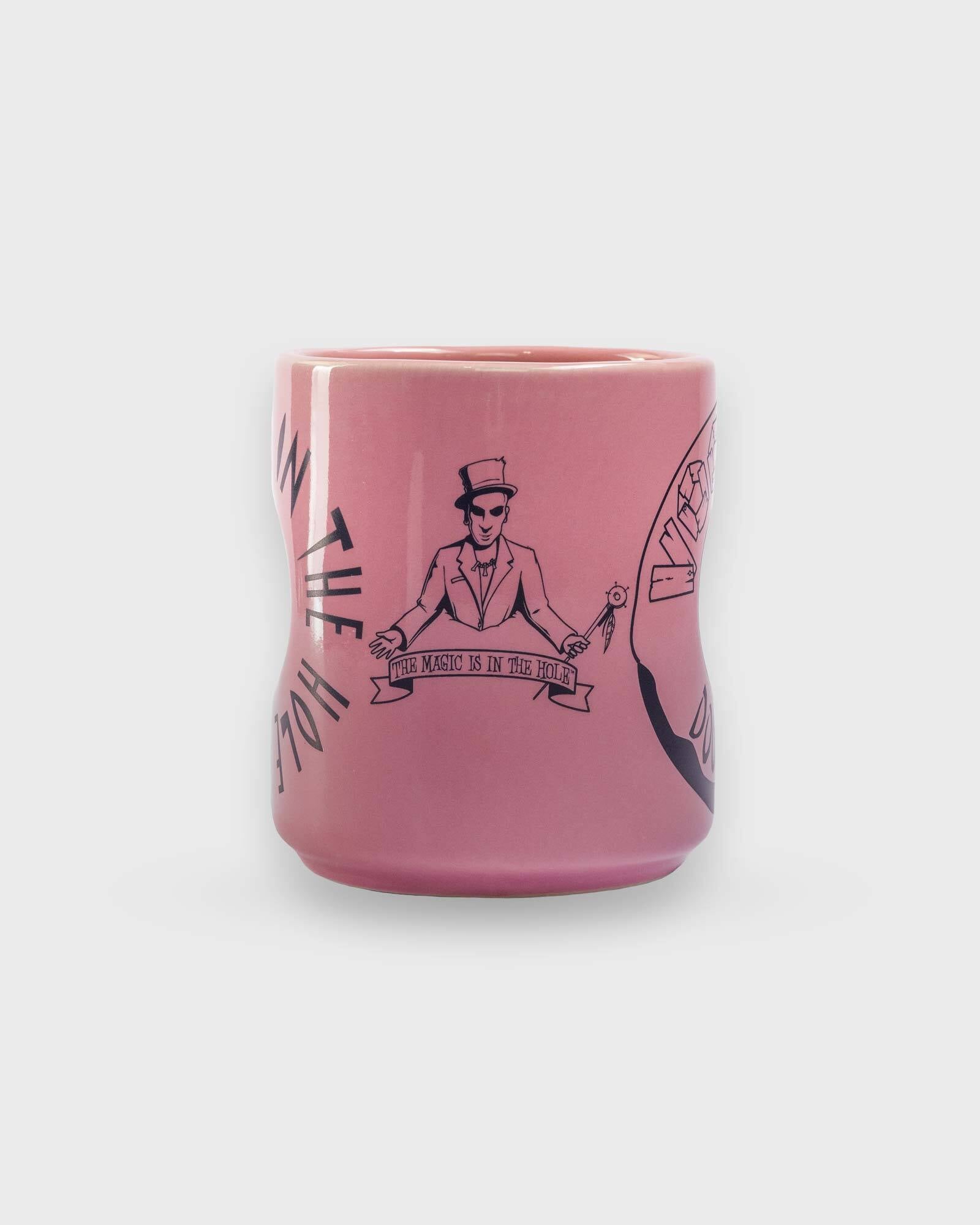 pink voodoo mug with hole 