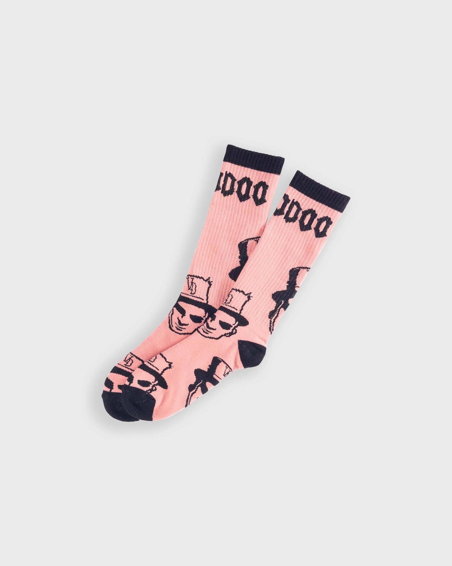 pink voodoo socks with black graphics